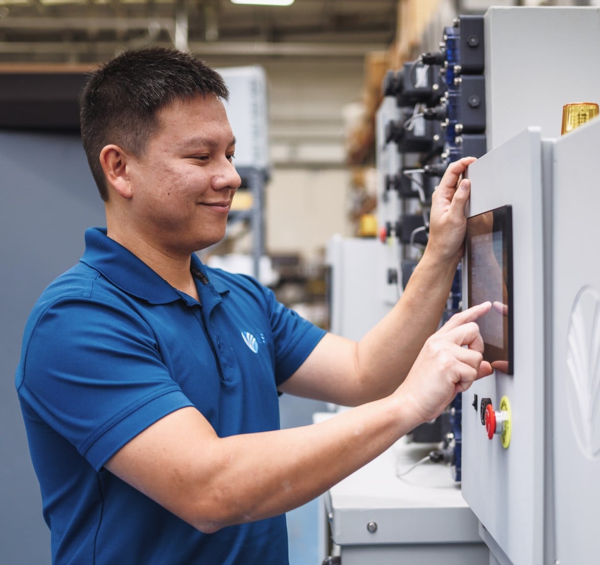 WSI technician operating equipment controls onsite