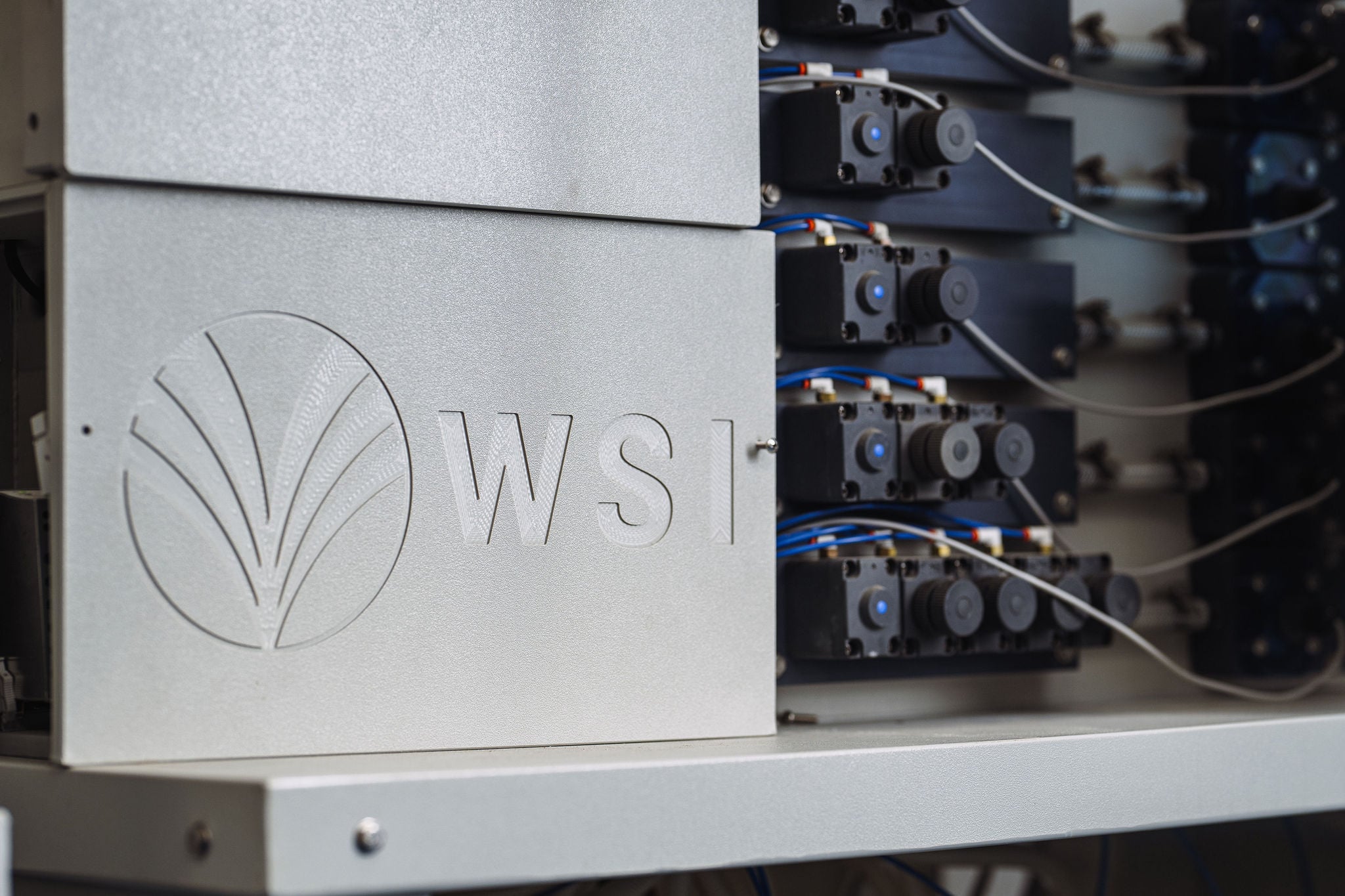WSI branded dispensing unit with chemical pumps
