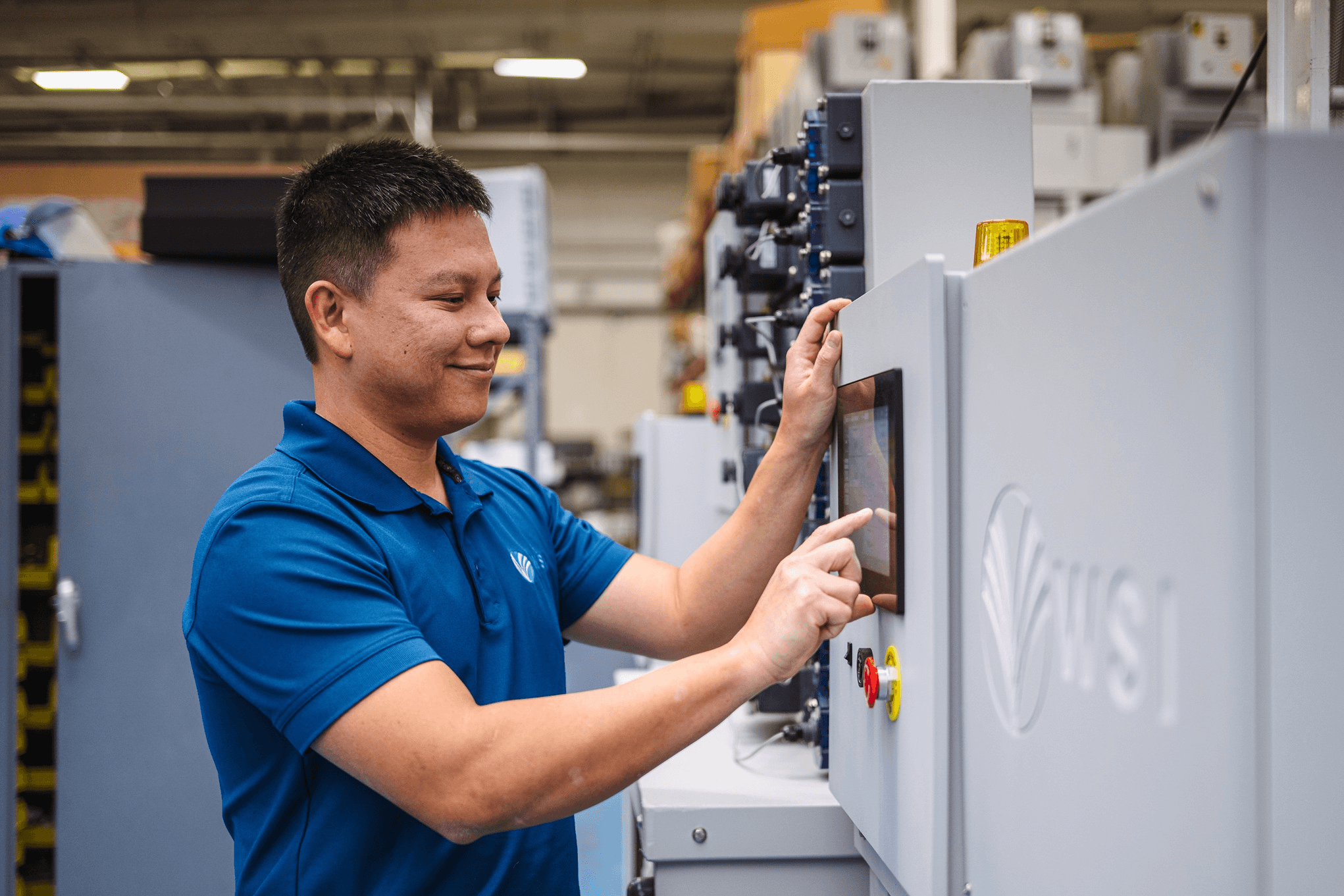 WSI technician adjusting a commercial dosing control panel