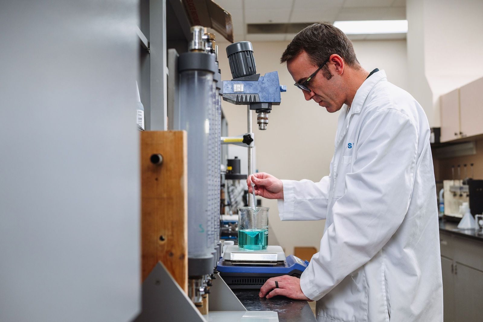 WSI technical consultant working with water treatment chemistry